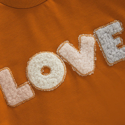 Love Embroidered Long Sleeve Round Neck Romper